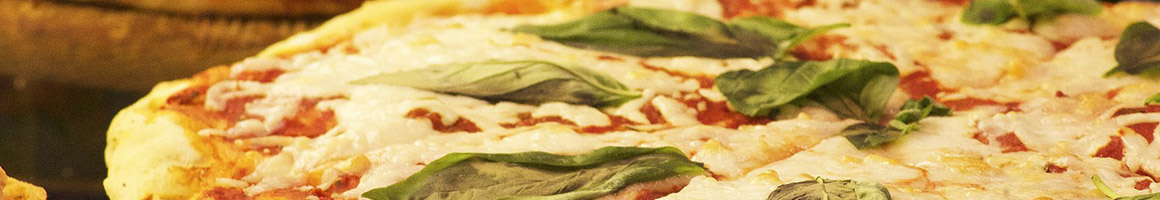 Eating Pizza Vegan at Bakaris Plant-based pizza restaurant in Atlanta, GA.
